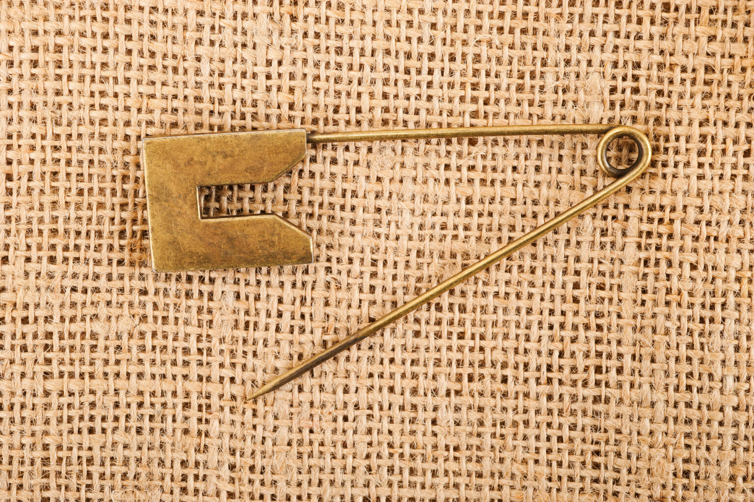 3 Ways A Tie Pin Will Damage Your Tie (Plus Solution)